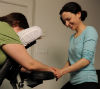 Squeeze Vancouver owner Leslie performing chair massage